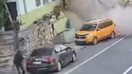 Cab driver narrowly escapes giant boulder