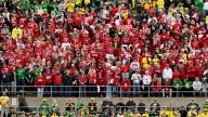 Indiana football fans play fight song at Upstairs Pub after win over Oregon