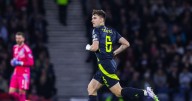 Steve Clarke sent a Kieran Tierney reality check by Arsenal legend after Celtic star left out at 'toxic' Hampden