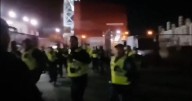Moment Edinburgh police draw batons in face-off with fans at derby match
