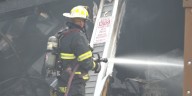 Fire destroys Holden garage, home saved