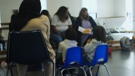 From the Dominican Republic to Kazakhstan, Nashua families connect with bilingual story time