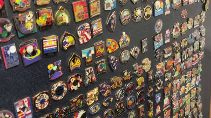 Balloon Fiesta-goers collect commemorative pins marking the 2025 season