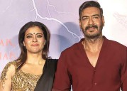 Ajay Devgn & Kajol twin in green during the Maha Navmi celebration