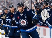Winnipeg Jets captain Adam Lowry back with the boys