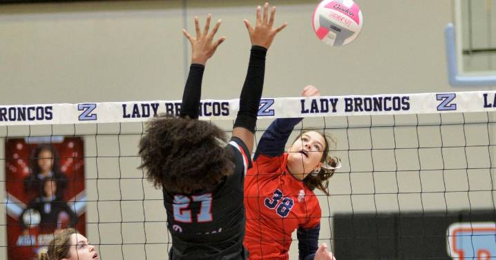 Zachary and St. Joseph's play in high school volleyball game