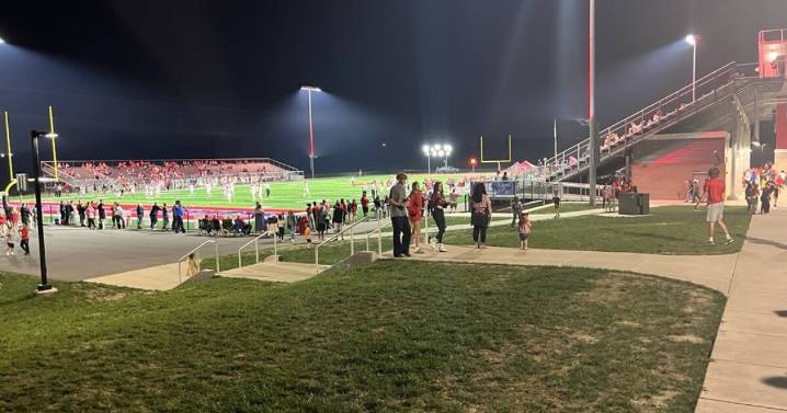 Decades of dedication: Retiring Scott County custodian honored at football game