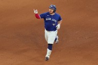 Kirk hits two solo homers to lead Blue Jays to 10-1 rout of Yankees in series opener