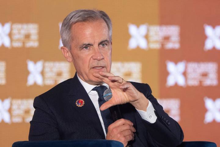 Carney tries to reassure Canadians after Trump threatens 10% tariff hike