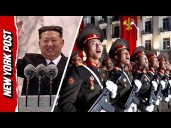 North Koreans go Wild at Military Parade as Kim Jong Unveils New Intercontinental Ballistic Missile