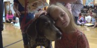 Reading therapy dog celebrates birthday with free books for students