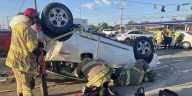 Clarksville firefighters rescue driver from flipped car after crash