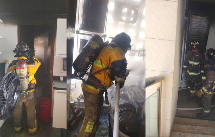 Bomberos atienden un incendio en una de las torres de Puerto Cancún