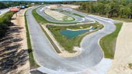 Vehicle enthusiasts learning new driving circuit at motorsports complex off I