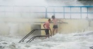 Storm Amy: Worrying photos show swimmers in dangerous high waves despite weather warning