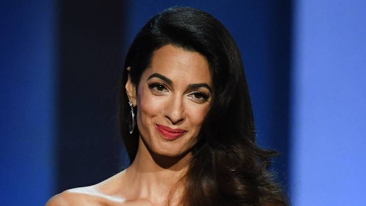 Amal Clooney's emerald suede trench coat is autumn 2025's power piece