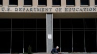 Mass layoffs of federal workers begins as Trump ramps up pressure over shutdown