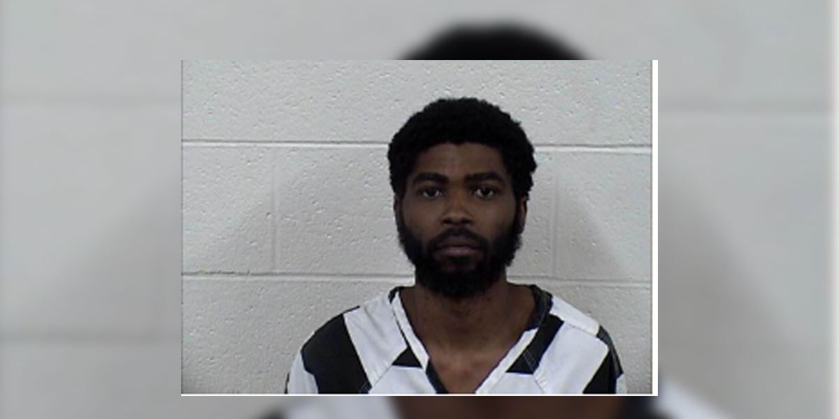 Man charged after body found in Panola Co. driveway