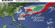 Bermuda gets glancing blow from distant hurricane Humberto as it braces for more powerful Imelda