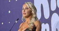 Emma Louise Jones stuns in 'wowzers' dress as guests 'don't know where to look'