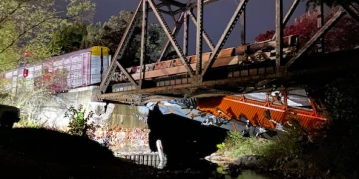 Train derails over Turkey Creek in Joplin, Mo.