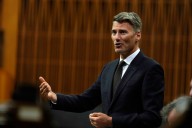 Housing Minister sidesteps question on campaign promise to cut development fees