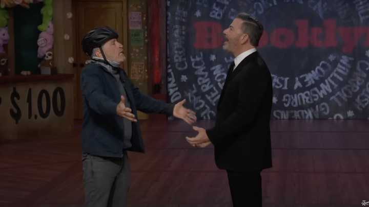 Jon Stewart crashes Jimmy Kimmels monologue, slaps the host twice