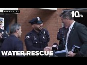 Police officers honored for rescuing elderly man who drove into water