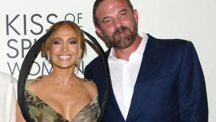 Jennifer Lopez and Ben Affleck look cosy on the red carpet a year after she filed for divorce