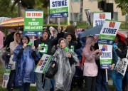 Thousands of nurses strike at Kaiser as rain pounds Southern California