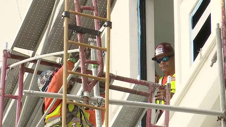 Crews continue to work on scaffolding, leaving East Commerce St. closed amid busy weekend downtown