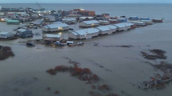 Officials airlift evacuees to safety after the remnants of Typhoon Halong devastate Alaska villages