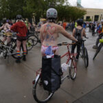Naked bike riders demonstrate against federal troops in ‘quintessentially Portland’ protest