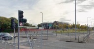 Biker in hospital as crash closes busy road near Glasgow shopping centre
