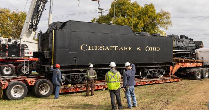 Locomotive transport begins in Huntington with departure of coal tender