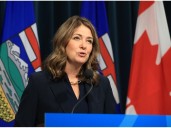Premier Danielle Smith instructs health ministers to improve wait times, transition non
