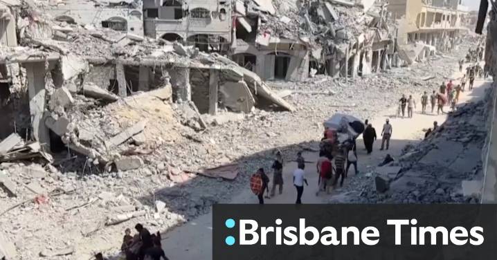 Thousands of Palestinians return to what remains of their homes as Gaza ceasefire begins