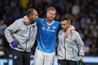 Kevin De Bruyne goes off injured after scoring penalty to set Napoli up for 3