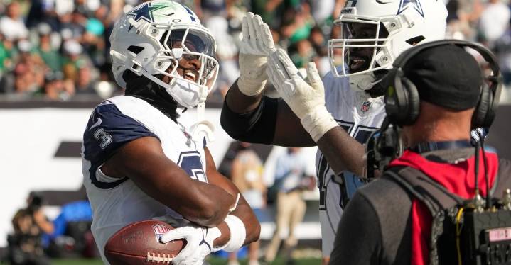Cowboys overcome injuries, blow out Jets on the road