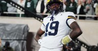 Justice Haynes runs for 152 yards and 2 TDs as No. 25 Michigan beats Michigan State 31