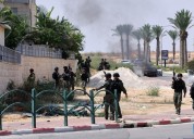 Red Cross begins transfer of hostages under Israel