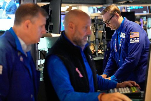 Wall Street rises toward more records, but yields sink on discouraging data about the job market