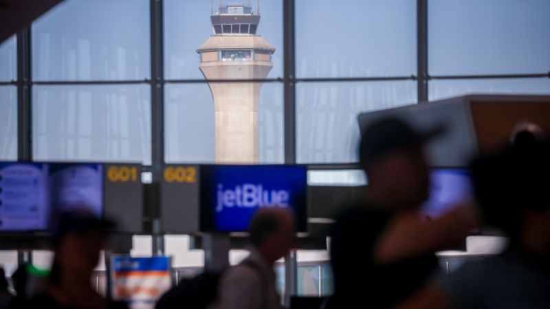 Government shutdown hits air travel, closing a control tower and causing delays across the country