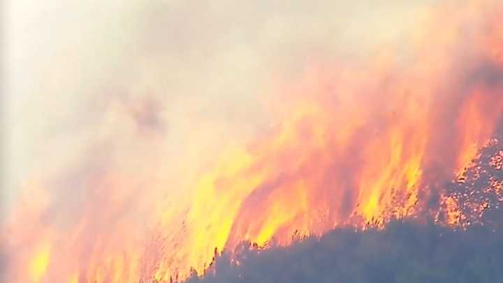 Campers evacuated as large bushfire burns