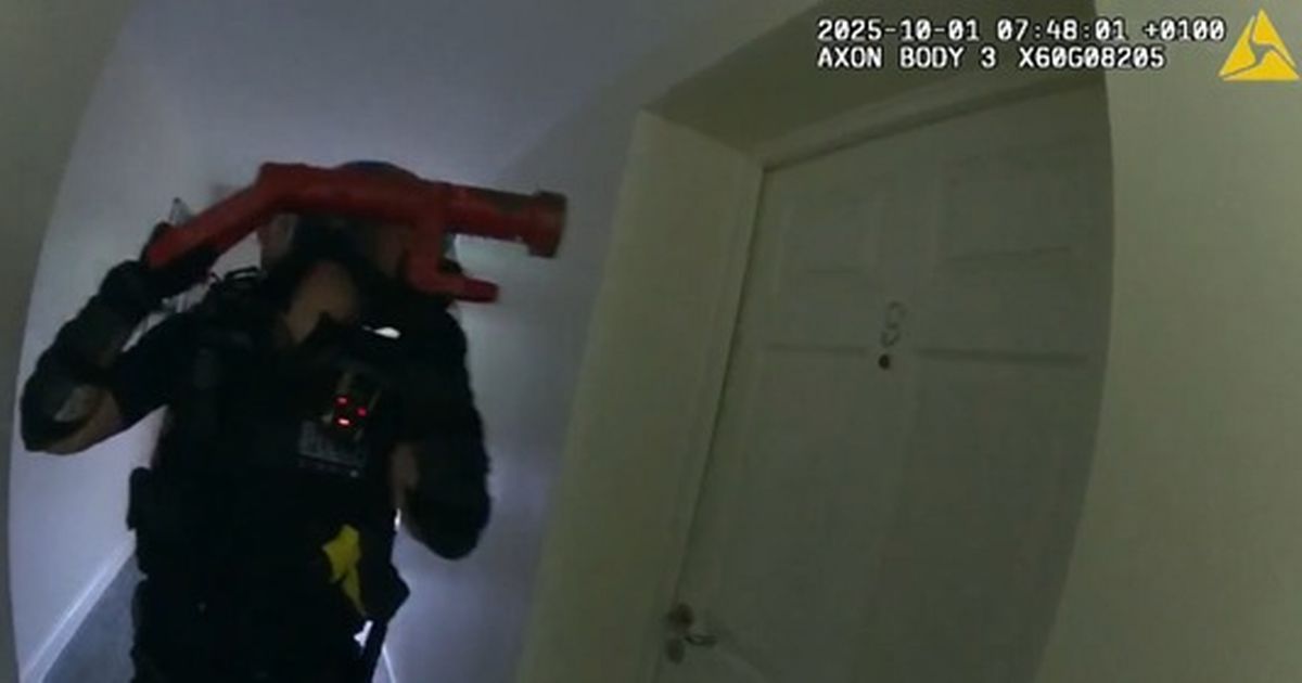 Moment police smash their way into Warwickshire flat
