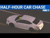 Possibly armed kidnapping suspect leads police chase