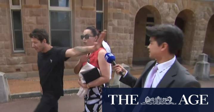 Supporters lash out at cameras outside court