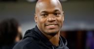 Former NFL star Adrian Peterson arrested in Houston suburb on DWI and gun charges