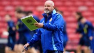 Katy Perry goes unnoticed by Scotland's soccer coach as his team shares a hotel with pop star