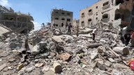 Top officials from US and Qatar join talks aimed at brokering peace in Gaza